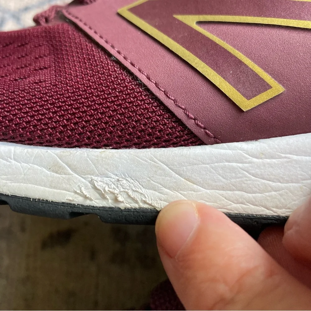 New Balance women’s Burgundy Sneakers with Gold Accent